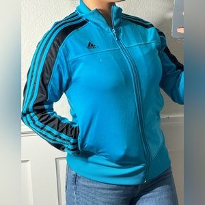 Sports adidas sweater in a size small.